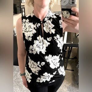 XL NWT black, white floral Sleeveless, button clasp top. WHBM Easy care material